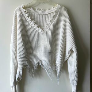 Distressed cropped sweater